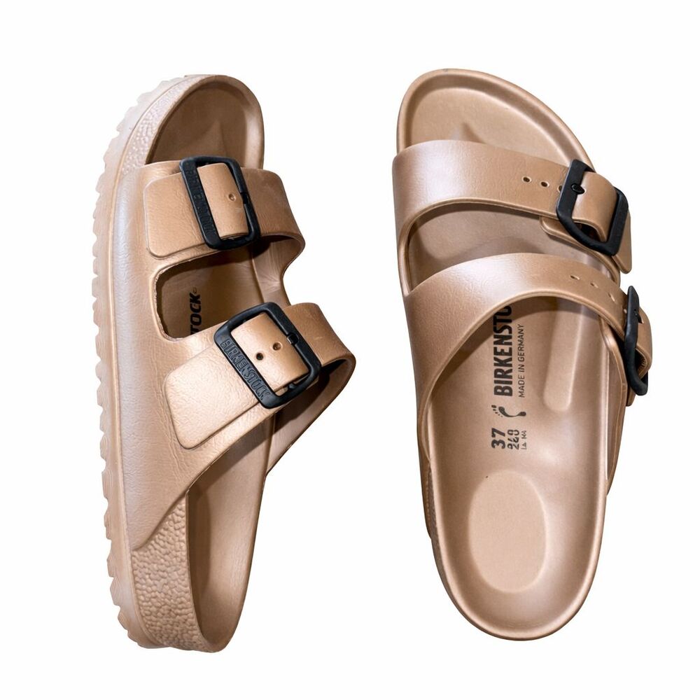 Birkenstock Two-Strap EVA Sandals in Metallic Champagne with Black Buckles